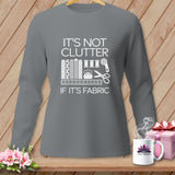 Gray long-sleeve shirt with white text and sewing graphics reading 