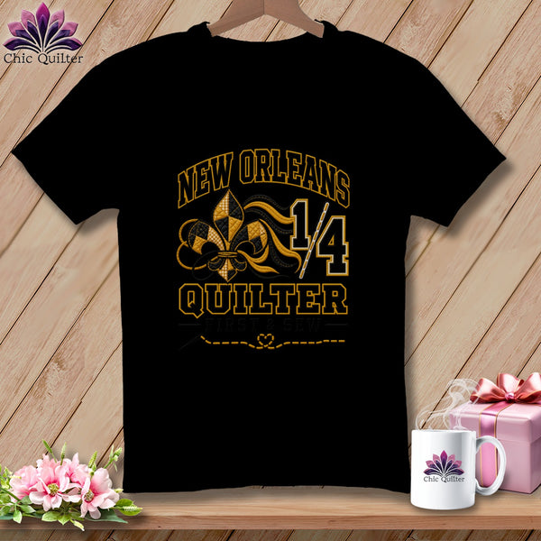 Black short-sleeved t-shirt with a New Orleans Quilter design featuring a fleur-de-lis and text.