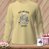 Light yellow long sleeve shirt with skeleton sewing and text 
