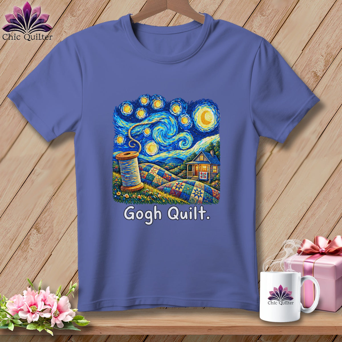 Purple t-shirt with a quilt pattern under a starry night sky with a spool of thread.