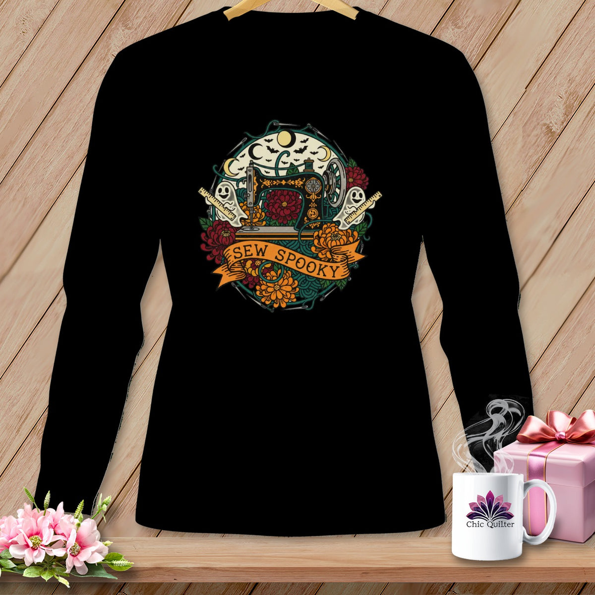Black long sleeve shirt with a Halloween-themed sewing graphic reading "Sew Spooky".