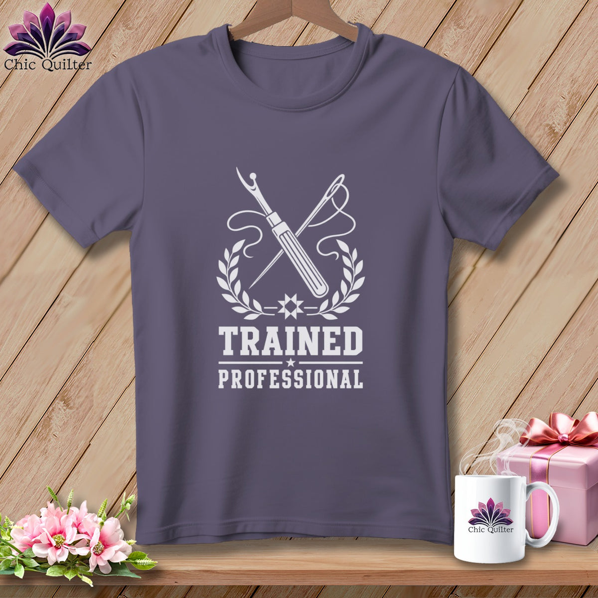 T-shirt with "Trained Professional" text and sewing tools logo.