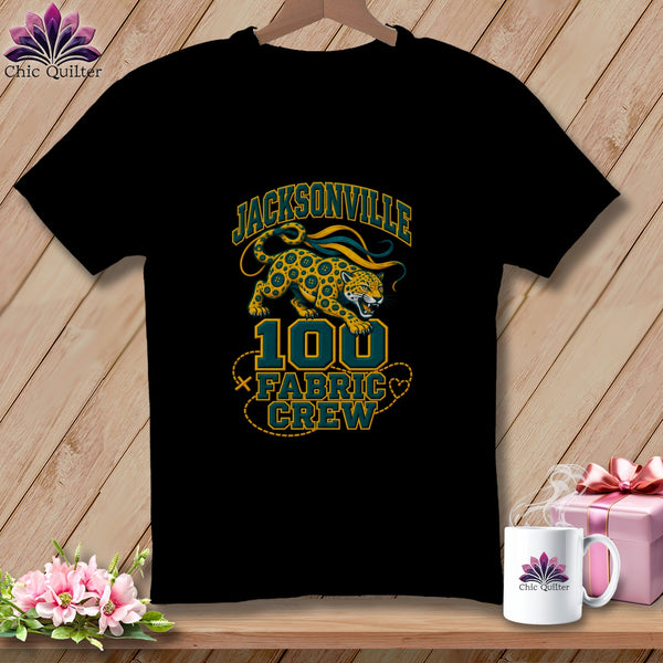 Black crewneck t-shirt featuring a Jacksonville 100 Fabric Crew graphic with a jaguar illustration.
