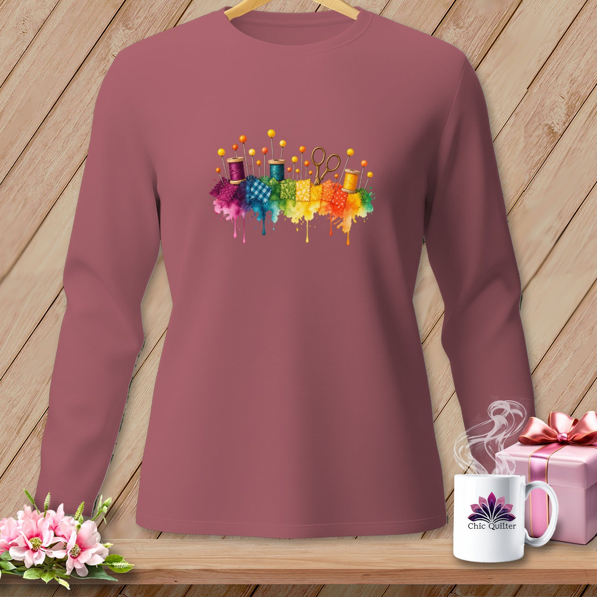Long-sleeve shirt with colorful sewing notion graphic and "Chic Quilter" mug.