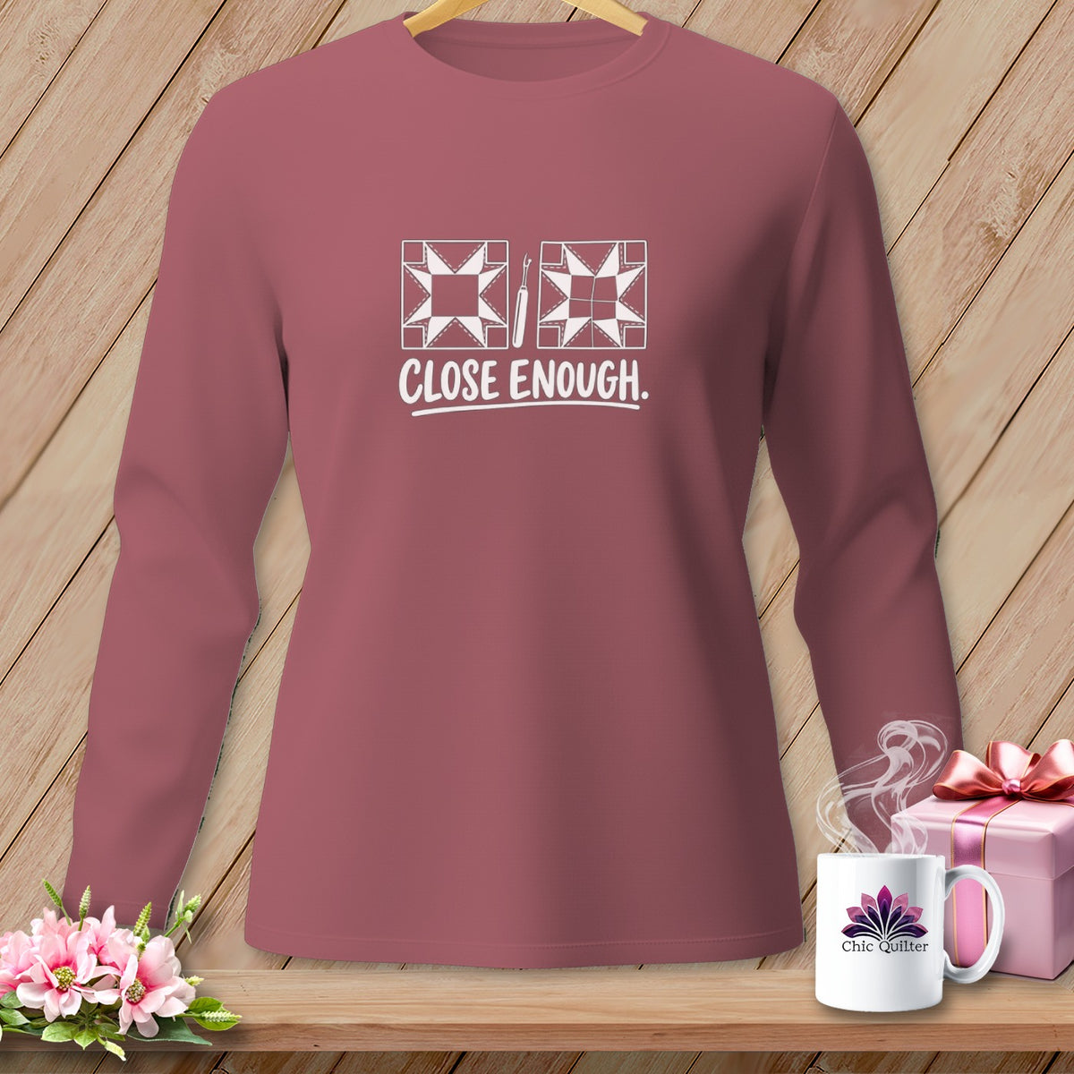Mauve long-sleeve shirt with "CLOSE ENOUGH" and quilting graphics.