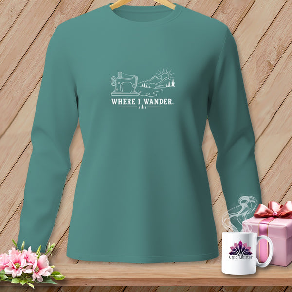 Teal long-sleeve shirt with sewing machine, mountains, and text "WHERE I WANDER."