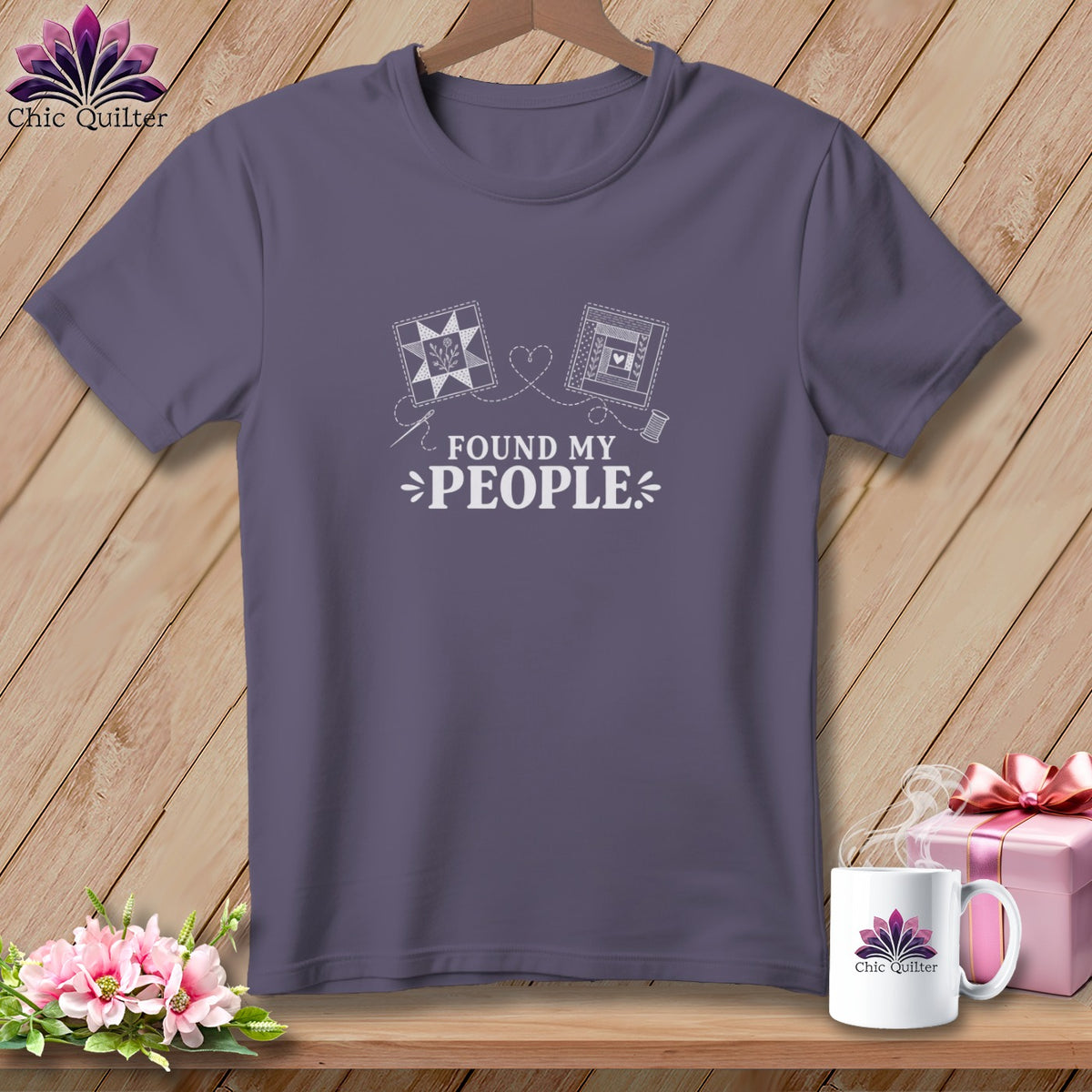 Purple t-shirt with "FOUND MY PEOPLE" text and quilt designs.