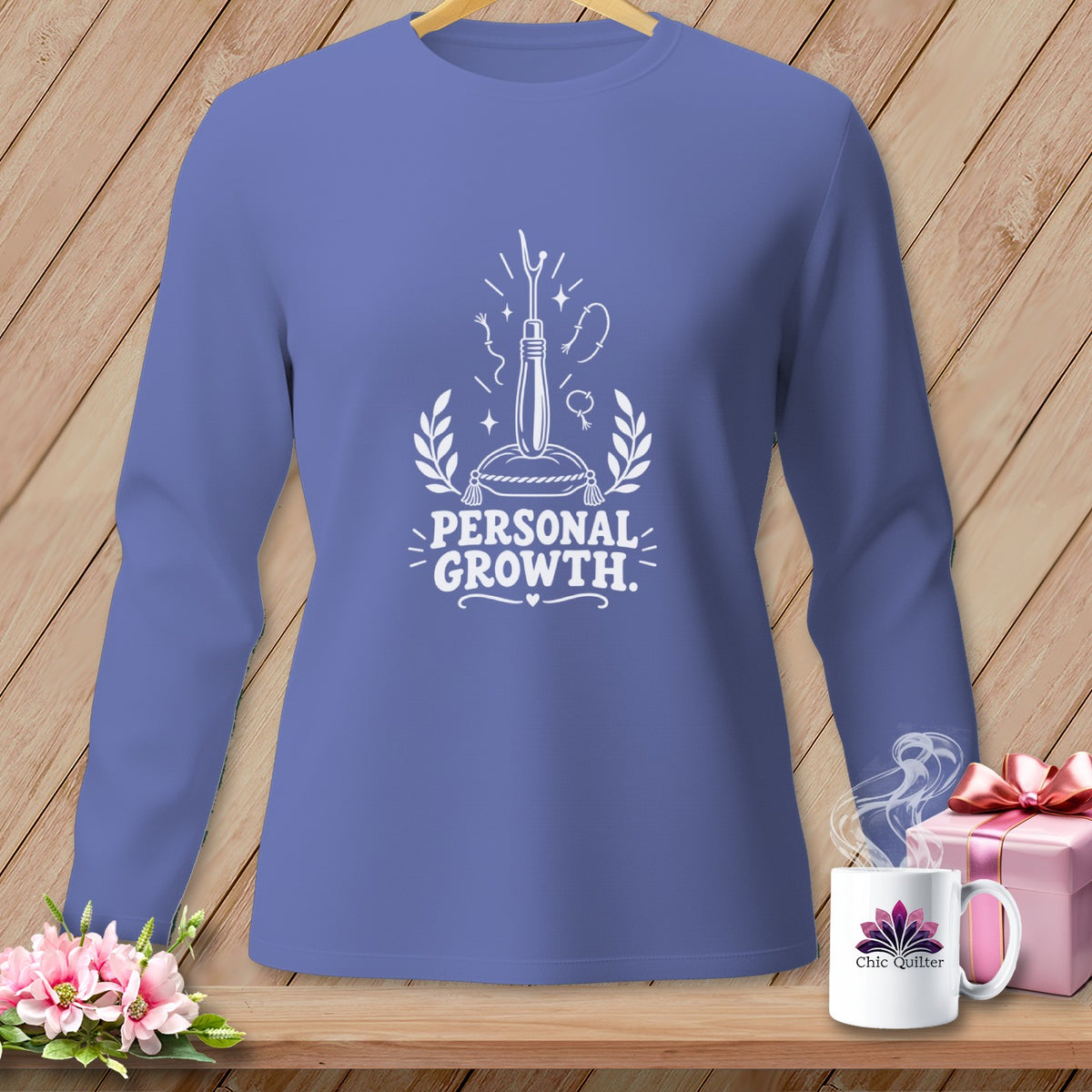 Long-sleeve shirt with "Personal Growth" text and sewing graphic.