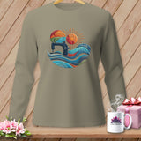 Long sleeve shirt with a sewing machine, colorful fabric waves, and sun graphic.