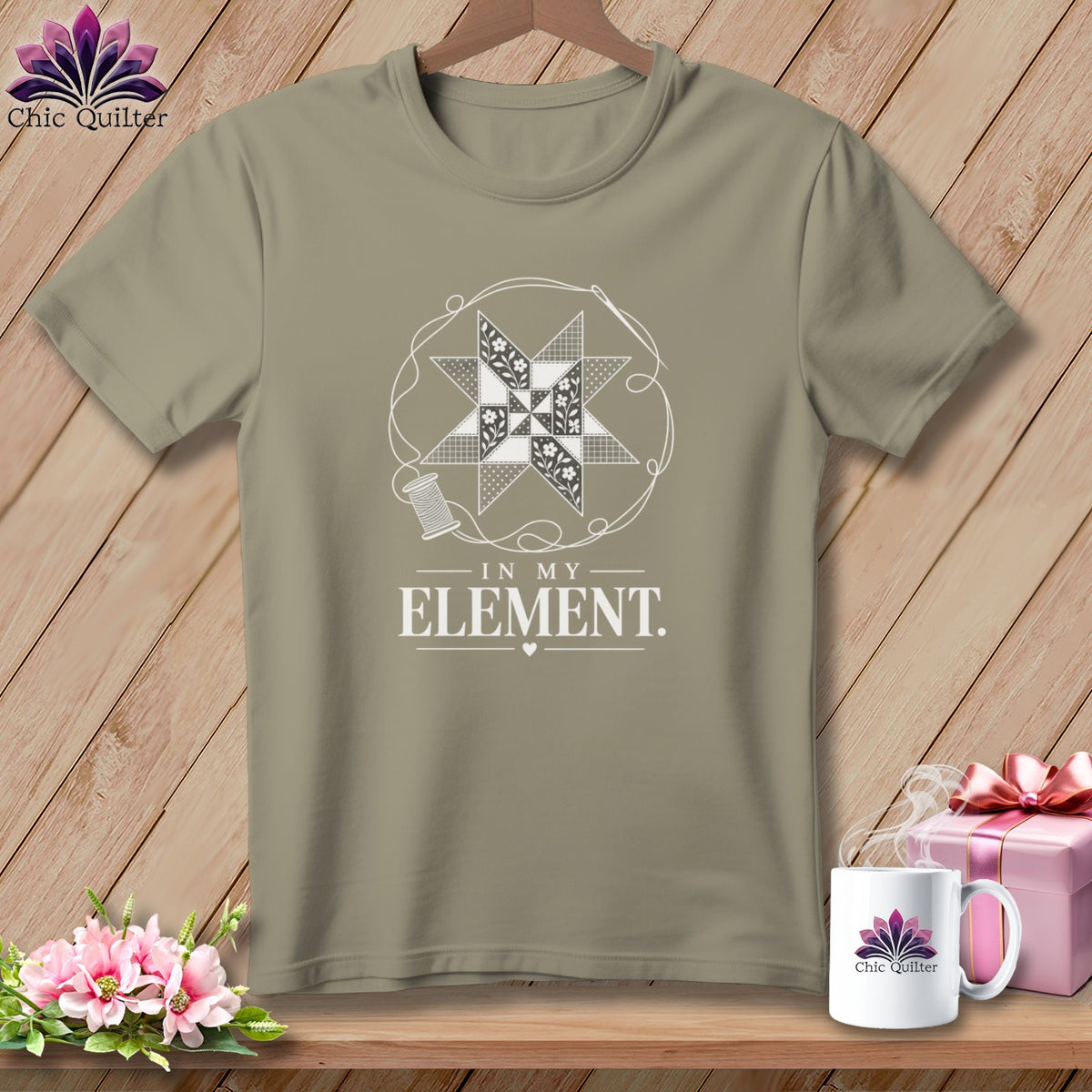 Tan t-shirt with quilting design, spool of thread, and text "In My Element".