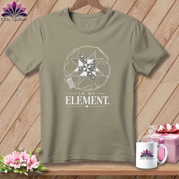 Tan t-shirt with quilting design, spool of thread, and text "In My Element".