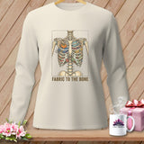 Cream long-sleeve shirt with a skeleton chest filled with fabric scraps and text 