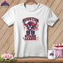 A white t-shirt hanging on a wooden background, featuring a graphic of a bull's head, the text Houston 99 Stash League, and sewing-related details.