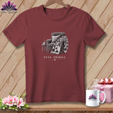 Maroon t-shirt with armchair, quilt, and 