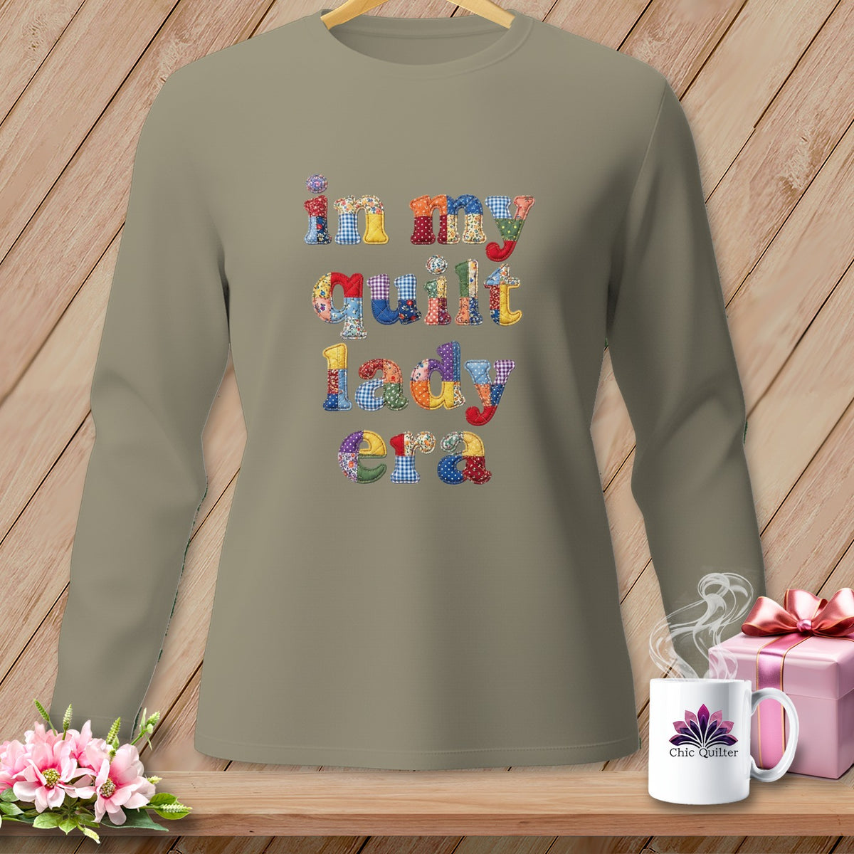Long sleeve t-shirt with "in my quilt lady era" text in patchwork fabric letters.