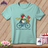 Penguin in sewing hat rides bicycle with fabric rolls; text reads 