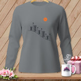 Gray long-sleeve shirt with spools of thread design and orange button logo.