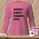 Pink long-sleeve shirt with black text 