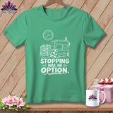 Green t-shirt with sewing machine, fabric stack, clock, and text 
