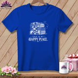 Blue t-shirt with stack of quilts and 