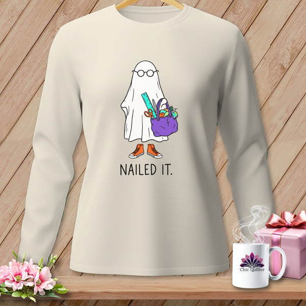 Crewneck shirt with ghost graphic and "NAILED IT." text.
