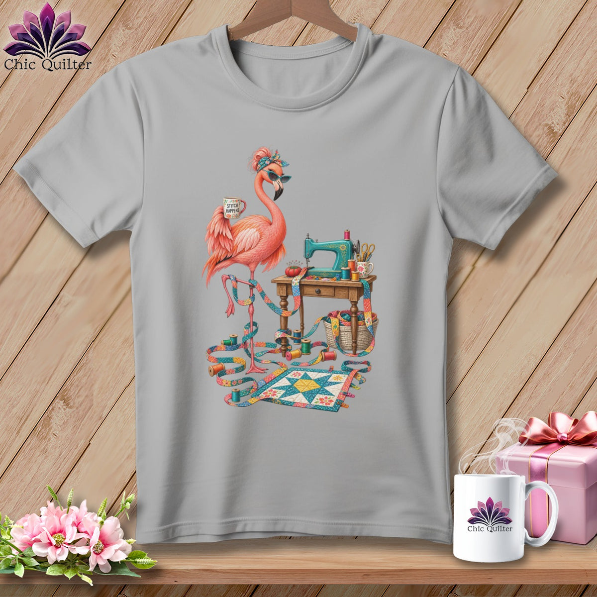 Pink flamingo with sunglasses and "Stitch Happens" mug beside a sewing machine.
