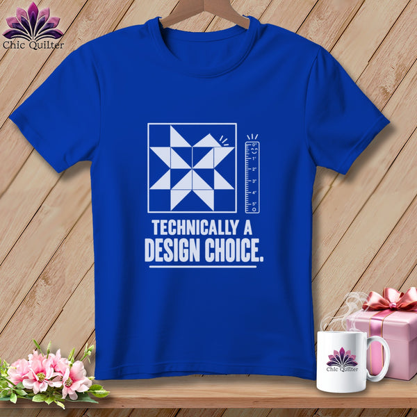 Royal blue t-shirt with a quilt block design and "Technically a Design Choice" text.