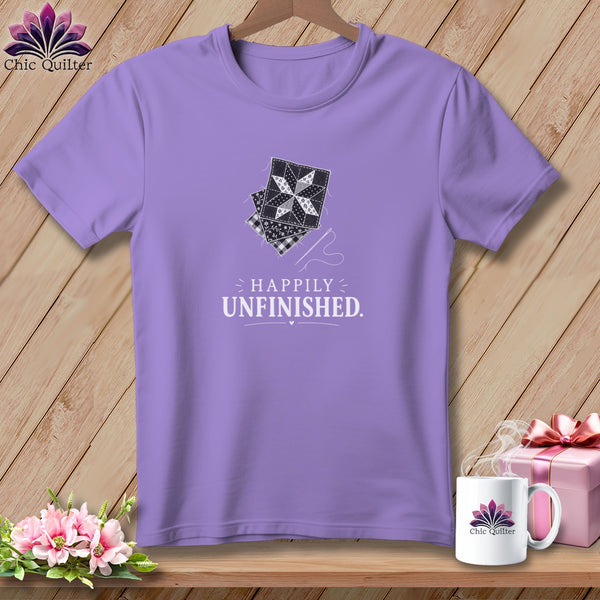Purple t-shirt with patchwork squares and text "Happily Unfinished".