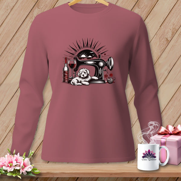 Long-sleeve shirt with a sewing machine, dog, wine, and yarn graphic.