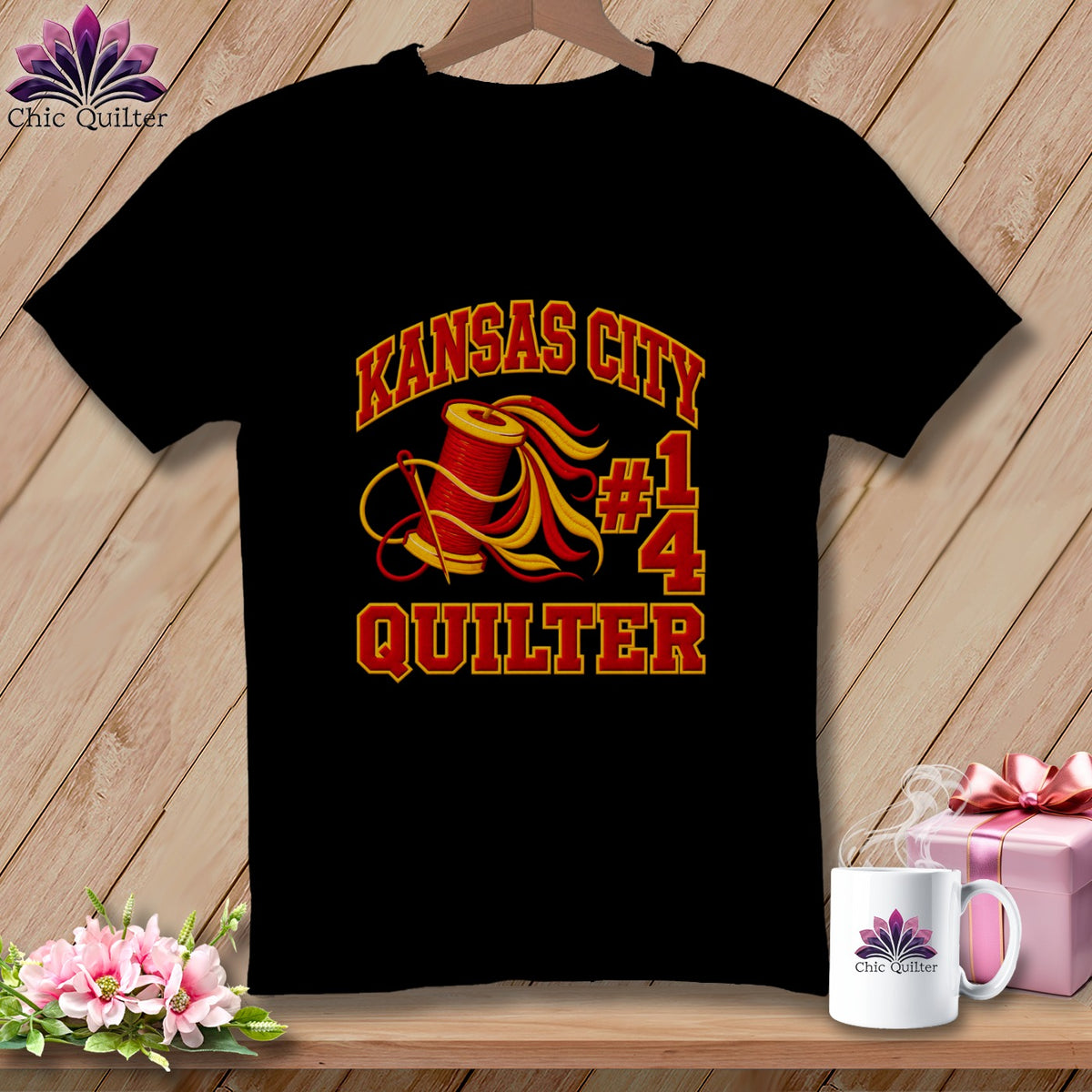 Black t-shirt featuring a red and yellow Kansas City Quilter graphic with a spool of thread.