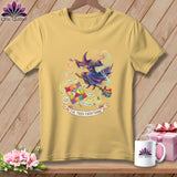 Yellow t-shirt with a witch flying on a broomstick with a quilt and sewing notions.