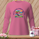 Pink long-sleeve shirt with a colorful sewing machine graphic and text.