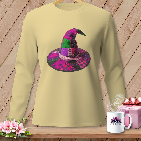 Long-sleeve shirt with a colorful patchwork witch hat graphic and "Sew Witchy" text.