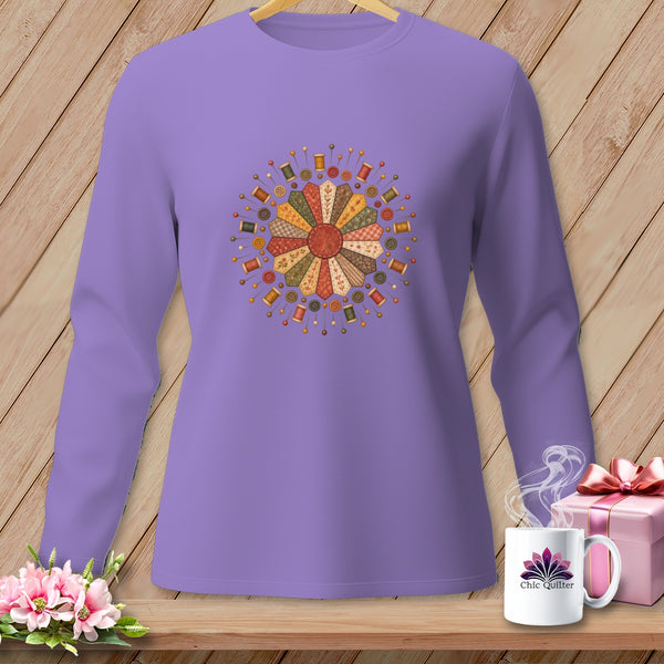Purple long-sleeve shirt with a circular quilting design featuring spools of thread and buttons.