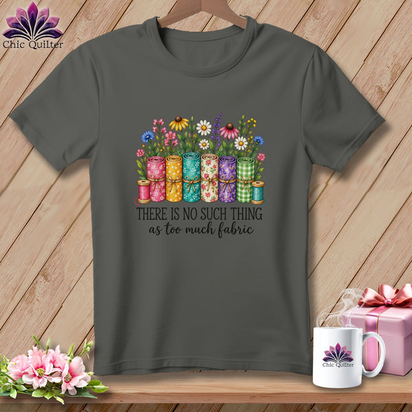 Dark gray t-shirt with a graphic of fabric rolls, flowers, and the text "There is no such thing as too much fabric."
