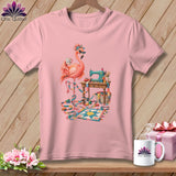 Pink t-shirt featuring a flamingo holding a 