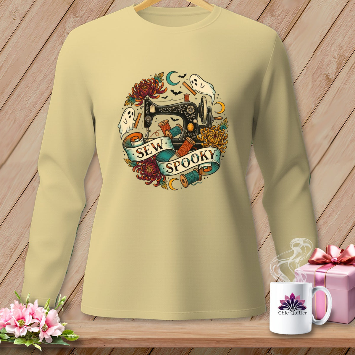 Cream long-sleeve shirt with "Sew Spooky" text and Halloween sewing motif.