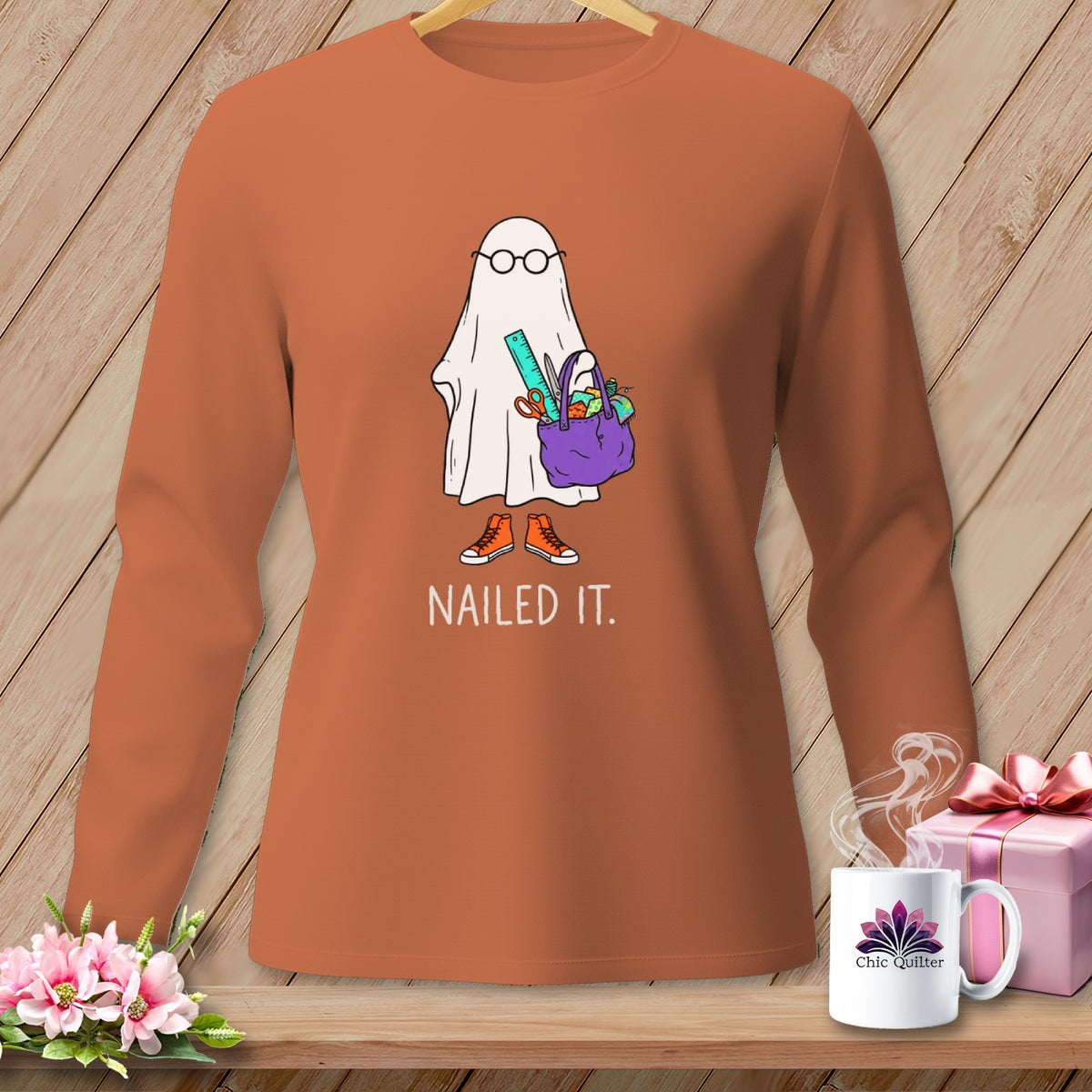 Ghost with glasses and school supplies says "Nailed It."