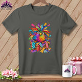 Dark gray t-shirt featuring a colorful, whimsical owl graphic sitting in a basket of fabric scraps.