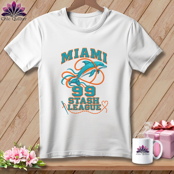 A white t-shirt features a graphic with a dolphin, the number 99, and the text Miami Stash League.
