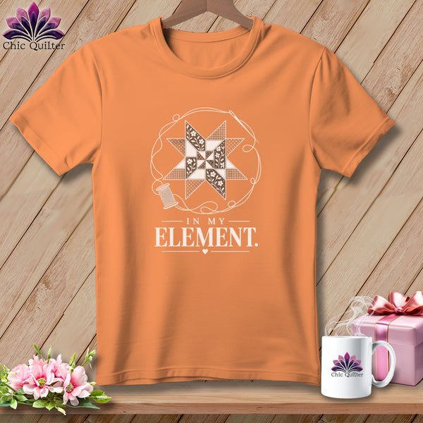 Orange t-shirt with "In My Element" text and quilting graphic.