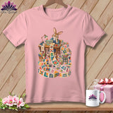 Pink t-shirt featuring a rabbit sewing a long, colorful quilt.