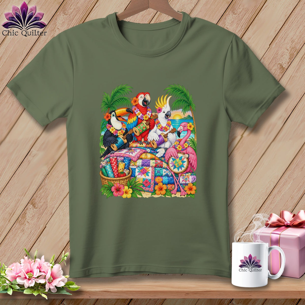 Olive green t-shirt featuring a graphic of tropical birds playing instruments around a colorful quilt.