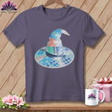 Purple t-shirt with patchwork witch hat graphic featuring scissors and tape measure.