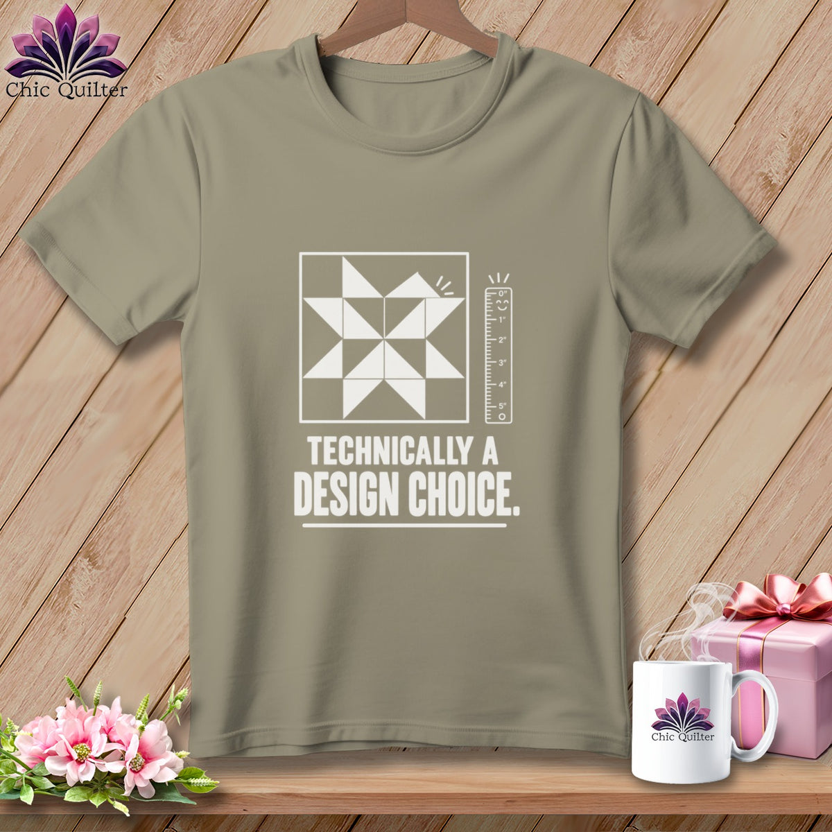 Tan t-shirt with quilt block graphic and text "Technically a Design Choice".