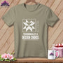 Tan t-shirt with quilt block graphic and text "Technically a Design Choice".