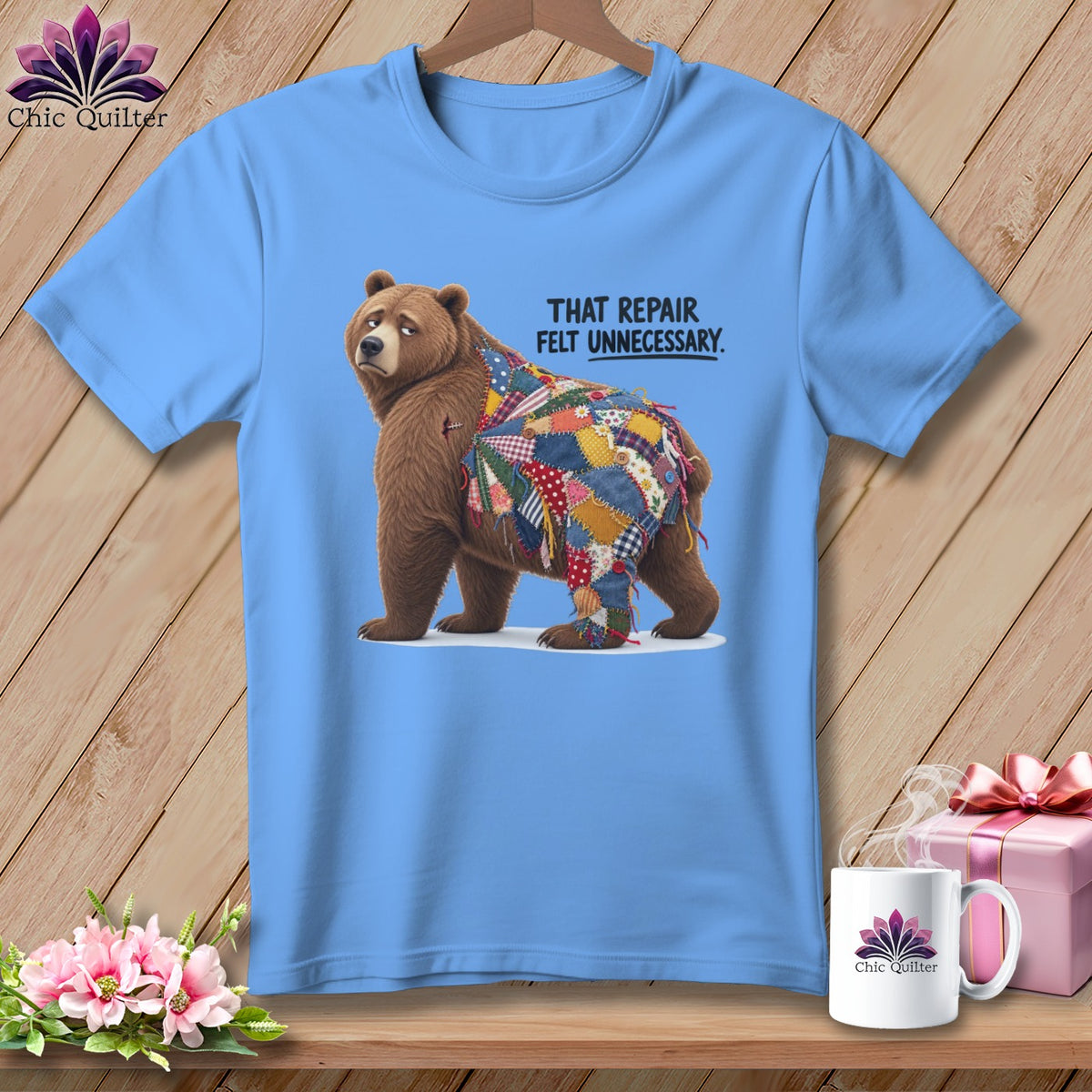 Bear with patchwork quilt design and text "That Repair Felt Unnecessary."
