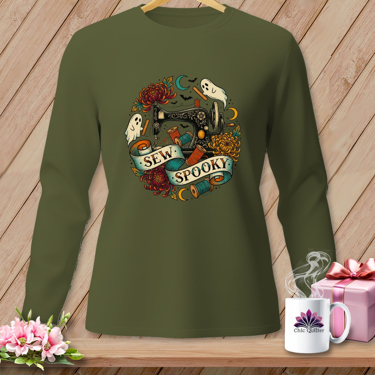 Green long-sleeve shirt with "Sew Spooky" text and a Halloween-themed sewing machine graphic.