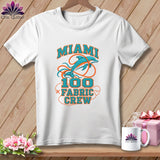 A white crewneck t-shirt featuring a Miami 100 Fabric Crew graphic with a dolphin.