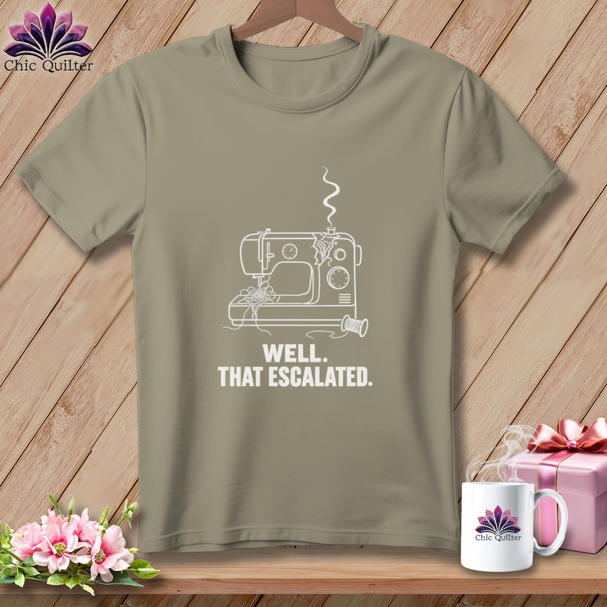 T-shirt with white line art of a sewing machine and text "WELL. THAT ESCALATED."